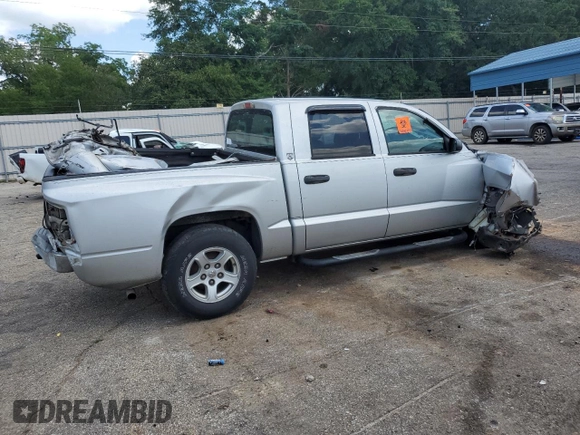 2005 Dodge Dakota SLT with VIN 1D7HE48K15S133160, listed as a Copart auction lot 70200384 with 233,215 mi miles and Salvage Title. Bid and sale history available at DreamBid. Image 3.