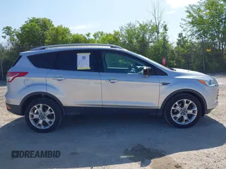 2015 Ford Escape Titanium with VIN 1FMCU9J94FUA65188, listed as a IAAI auction lot 42516728 with 65,969 mi miles and . Bid and sale history available at DreamBid. Image 13.