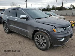 2017 Jeep Grand Cherokee Overland with VIN 1C4RJFCT5HC874593, listed as a Copart auction lot 46770205 with 72,744 mi miles and Salvage Title. Bid and sale history available at carsss.com. Image 4.