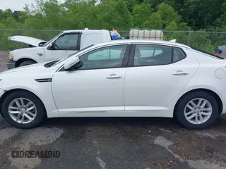 2013 Kia Optima LX z VIN KNAGM4A72D5366828, wystawiony jako IAAI lot #42106525 z przebiegiem 159 564 mil mil oraz . Historia ofert i sprzedaży dostępna na DreamBid. Obrazek 14.