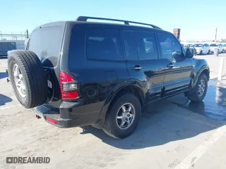 2002 Mitsubishi Montero LTD with VIN JA4MW51R72J014706, listed as a IAAI auction lot 41829993 with 201,091 mi miles. Bid and sale history available at carsss.com. Image 4.