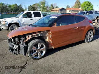 2016 Hyundai Veloster z VIN KMHTC6AD3GU254048, wystawiony jako Copart lot #57477415 z przebiegiem 114 892 mil mil oraz Szkoda całkowita • Salvage title. Historia ofert i sprzedaży dostępna na DreamBid. Obrazek 1.