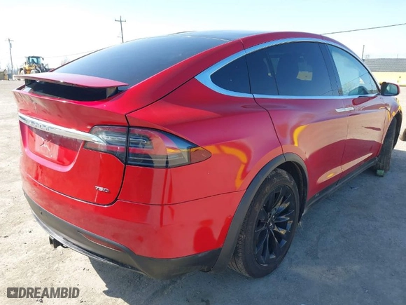 2016 Tesla Model X 70D with VIN 5YJXCAE27GF021994, listed as a IAAI auction lot 41976475 with 70,771 mi miles. Bid and sale history available at carsss.com. Image 4.