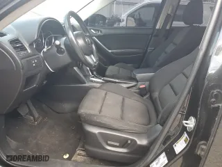 2014 Mazda CX-5 Touring with VIN JM3KE2CY7E0427312, listed as a Copart auction lot 52869335 with 192,903 mi miles and Salvage Title. Bid and sale history available at carsss.com. Image 7.