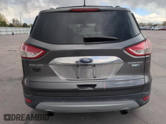2014 Ford Escape Titanium with VIN 1FMCU9J97EUB30467, listed as a Copart auction lot 54949035 with 112,013 mi miles and Salvage Title. Bid and sale history available at DreamBid. Image 6.