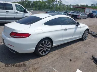 2018 Mercedes-Benz C 300 with VIN WDDWJ4JB1JF629561, listed as a IAAI auction lot 42190511 with 119,514 mi miles and . Bid and sale history available at DreamBid. Image 4.