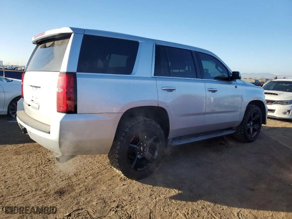 2015 Chevrolet Tahoe Commercial with VIN 1GNSK2EC9FR652628, listed as a Copart auction lot 82393714 with 122,001 mi miles and Salvage Title. Bid and sale history available at carsss.com. Image 3.