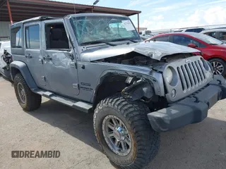 2015 Jeep Wrangler Unlimited Sport with VIN 1C4BJWDG7FL521854, listed as a IAAI auction lot 42733955 with 102,503 mi miles and . Bid and sale history available at DreamBid. Image 1.