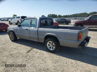 1993 Mazda B-Series Truck z VIN JM2UF3130P0378304, wystawiony jako Copart lot #58799925 z przebiegiem 132 801 mil mil oraz Szkoda całkowita • Salvage title. Historia ofert i sprzedaży dostępna na DreamBid. Obrazek 2.