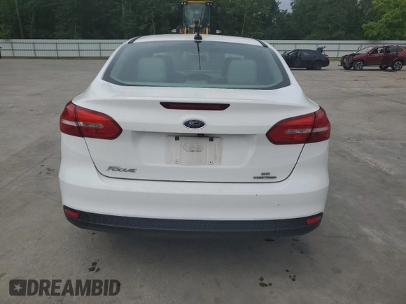 2015 Ford Focus SE with VIN 1FADP3F21FL246821, listed as a Copart auction lot 59732635 with 135,752 mi miles and Salvage title. Bid and sale history available at DreamBid. Image 6.