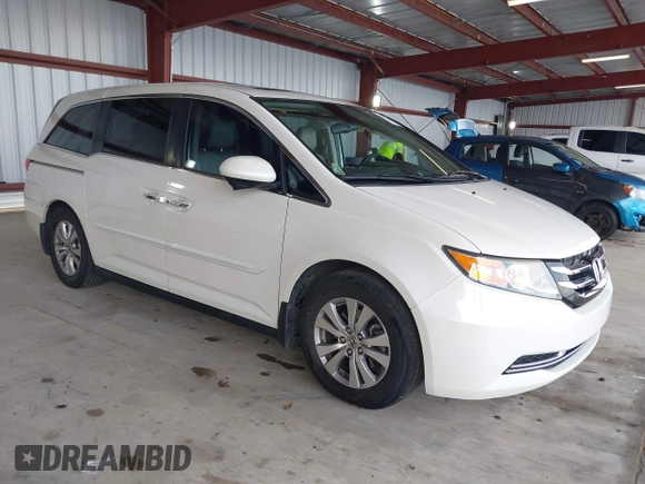 2015 Honda Odyssey EX-L with VIN 5FNRL5H64FB084175, listed as a IAAI auction lot 41943540 with 67,902 mi miles and . Bid and sale history available at carsss.com. Image 1.