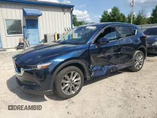 2021 Mazda CX-5 Grand Touring with VIN JM3KFBDM0M0484099, listed as a Copart auction lot 55227705 with 22,268 mi miles and Salvage Title. Bid and sale history available at DreamBid. Image 1.
