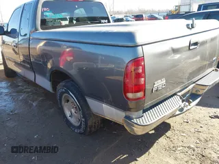 2003 Ford F-150 XL with VIN 2FTRX17W63CA93767, listed as a IAAI auction lot 41321830 with Not provided miles and . Bid and sale history available at DreamBid. Image 3.