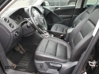 2013 Volkswagen Tiguan SE z VIN WVGBV7AX6DW550316, wystawiony jako Copart lot #56964595 z przebiegiem 157 526 mil mil oraz Szkoda całkowita • Salvage title. Historia ofert i sprzedaży dostępna na DreamBid. Obrazek 7.