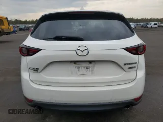 2017 Mazda CX-5 Grand Touring with VIN JM3KFBDL1H0208186, listed as a Copart auction lot 52685955 with 125,414 mi miles and Salvage Title. Bid and sale history available at carsss.com. Image 6.