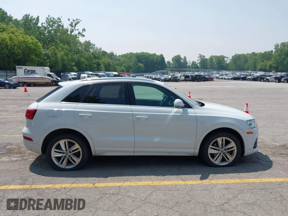 2016 Audi Q3 Premium Plus z VIN WA1EFCFSXGR014289, wystawiony jako IAAI lot #42440711 z przebiegiem 120 765 mil mil oraz . Historia ofert i sprzedaży dostępna na DreamBid. Obrazek 13.