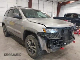 2017 Jeep Grand Cherokee Trailhawk with VIN 1C4RJFLG3HC603356, listed as a IAAI auction lot 42269418 with 158,499 mi miles and . Bid and sale history available at DreamBid. Image 1.