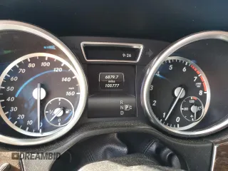 2014 Mercedes-Benz M 350 with VIN 4JGDA5JB0EA283475, listed as a Copart auction lot 57140295 with 105,777 mi miles and Salvage title. Bid and sale history available at DreamBid. Image 9.