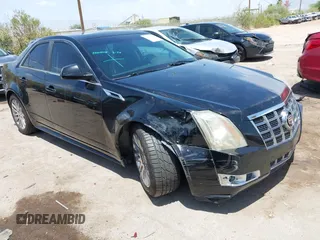 2012 Cadillac CTS Premium with VIN 1G6DP5E35C0129064, listed as a IAAI auction lot 42666308 with 151,694 mi miles and . Bid and sale history available at DreamBid. Image 1.