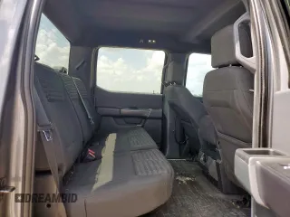 2021 Ford F-150 XL with VIN 1FTFW1E56MKD38046, listed as a Copart auction lot 61674525 with 89,477 mi miles and Salvage title. Bid and sale history available at DreamBid. Image 10.