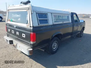 1987 Ford F-150 with VIN 2FTDF15Y2HCB10816, listed as a IAAI auction lot 41770760 with 86,290 mi miles. Bid and sale history available at carsss.com. Image 4.