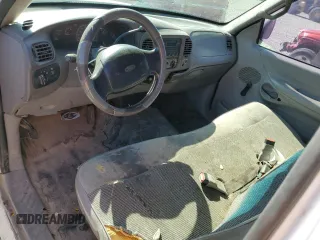 1998 Ford F-150 with VIN 1FTZX1720WKA20813, listed as a Copart auction lot 63852215 with 215,729 mi miles and Salvage title. Bid and sale history available at DreamBid. Image 8.