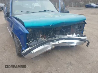 1997 GMC New Sierra 1500 SLE with VIN 1GTEC14W6VZ503469, listed as a IAAI auction lot 41798168 with 232,567 mi miles. Bid and sale history available at carsss.com. Image 6.
