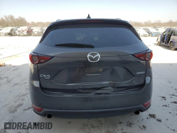 2021 Mazda CX-5 Grand Touring with VIN JM3KFBDM0M1464817, listed as a Copart auction lot 48821965 with 53,648 mi miles and Clean Title. Bid and sale history available at carsss.com. Image 6.