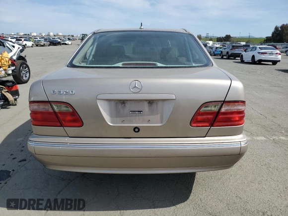 2001 Mercedes-Benz E-Class with VIN WDBJF65J11B357893, listed as a Copart auction lot 48573305 with 141,044 mi miles and Salvage Title. Bid and sale history available at carsss.com. Image 6.