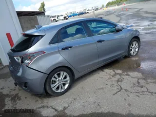 2013 Hyundai Elantra GT with VIN KMHD35LE9DU108608, listed as a IAAI auction lot 41781470 with 132,714 mi miles. Bid and sale history available at carsss.com. Image 4.