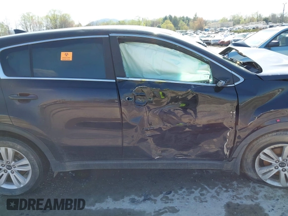 2019 Kia Sportage LX with VIN KNDPM3AC4K7621023, listed as a IAAI auction lot 41981361 with Not Provided miles and . Bid and sale history available at DreamBid. Image 13.