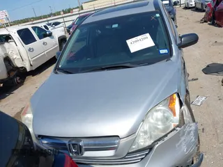 2009 Honda CR-V EX with VIN 3CZRE38559G705051, listed as a IAAI auction lot 42004200 with 185,218 mi miles and . Bid and sale history available at carsss.com. Image 12.