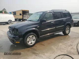 2002 Suzuki XL7 Standard with VIN JS3TX92V624114135, listed as a Copart auction lot 58942605 with 243,150 mi miles and Salvage title. Bid and sale history available at DreamBid. Image 1.
