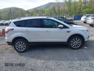 2017 Ford Escape Titanium with VIN 1FMCU9JD9HUB40135, listed as a IAAI auction lot 42054533 with 68,255 mi miles. Bid and sale history available at carsss.com. Image 13.