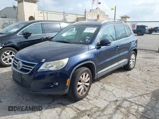 2011 Volkswagen Tiguan SE with VIN WVGAV7AX7BW530357, listed as a IAAI auction lot 42740821 with 170,636 mi miles and . Bid and sale history available at DreamBid. Image 2.