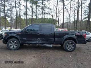 2013 Ford F-150 XL with VIN 1FTFW1ET3DFB96388, listed as a IAAI auction lot 41422990 with 156,708 mi miles and . Bid and sale history available at DreamBid. Image 14.