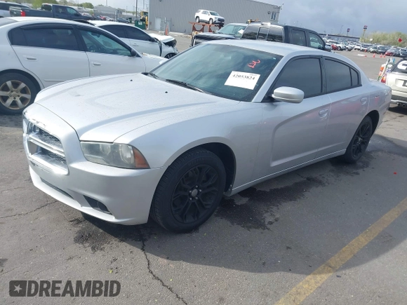 2012 Dodge Charger SE with VIN 2C3CDXBG5CH101849, listed as a IAAI auction lot 42053824 with 194,274 mi miles and . Bid and sale history available at DreamBid. Image 2.