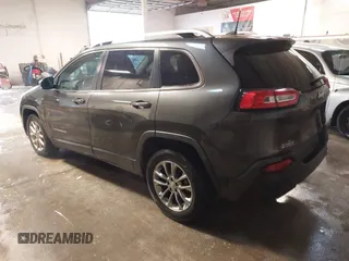 2016 Jeep Cherokee Altitude z VIN 1C4PJLCB0GW338970, wystawiony jako IAAI lot #41559196 z przebiegiem 129 366 mil mil oraz . Historia ofert i sprzedaży dostępna na DreamBid. Obrazek 3.