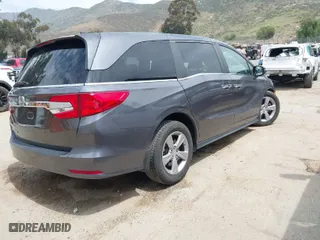 2018 Honda Odyssey EX-L with VIN 5FNRL6H76JB108175, listed as a IAAI auction lot 42031001 with 111,205 mi miles. Bid and sale history available at carsss.com. Image 4.