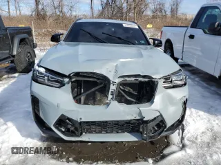 2024 BMW X4 M z VIN 5YM23EC01R9W18369, wystawiony jako Copart lot #53838455 z przebiegiem 11 550 mil mil oraz Szkody całkowita. Historia ofert i sprzedaży dostępna na DreamBid. Obrazek 5.