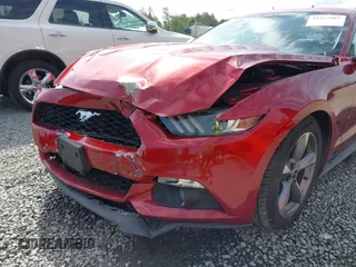 2016 Ford Mustang EcoBoost z VIN 1FA6P8TH5G5333819, wystawiony jako IAAI lot #42327887 z przebiegiem 124 870 mil mil oraz . Historia ofert i sprzedaży dostępna na DreamBid. Obrazek 6.