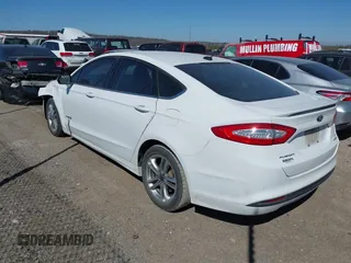 2016 Ford Fusion SE Hybrid with VIN 3FA6P0LU1GR127280, listed as a IAAI auction lot 41754682 with 194,357 mi miles. Bid and sale history available at carsss.com. Image 3.