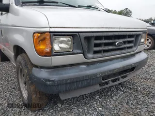 2005 Ford Econoline Cargo with VIN 1FTRE14W85HA67080, listed as a IAAI auction lot 40910996 with 599,247 mi miles. Bid and sale history available at carsss.com. Image 6.