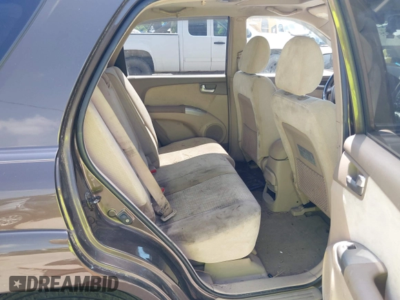 2005 Kia Sportage LX with VIN KNDJE723957075445, listed as a IAAI auction lot 42573760 with 185,000 mi miles and . Bid and sale history available at DreamBid. Image 8.