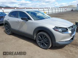 2024 Mazda CX-30 2.5 S Select Sport with VIN 3MVDMBBM5RM696655, listed as a IAAI auction lot 42003753 with 13,239 mi miles. Bid and sale history available at carsss.com. Image 1.