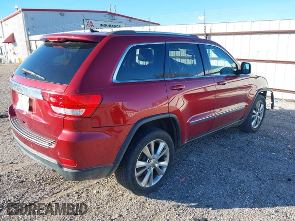 2013 Jeep Grand Cherokee Laredo with VIN 1C4RJEAG6DC636780, listed as a IAAI auction lot 41127701 with 135,026 mi miles. Bid and sale history available at carsss.com. Image 4.