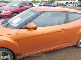 2012 Hyundai Veloster w/Gray Int with VIN KMHTC6AD3CU057620, listed as a IAAI auction lot 42320549 with 113,491 mi miles and . Bid and sale history available at DreamBid. Image 14.