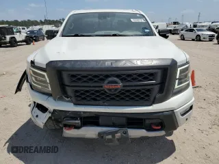 2021 Nissan Titan Pro-4X z VIN 1N6AA1ED0MN533801, wystawiony jako Copart lot #53301215 z przebiegiem 41 991 mil mil oraz Szkoda całkowita • Salvage title. Historia ofert i sprzedaży dostępna na DreamBid. Obrazek 5.