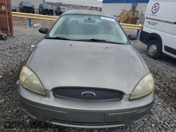 2004 Ford Taurus SE with VIN 1FAFP53274A193186, listed as a Copart auction lot 60255125 with 184,493 mi miles and Salvage title. Bid and sale history available at DreamBid. Image 5.