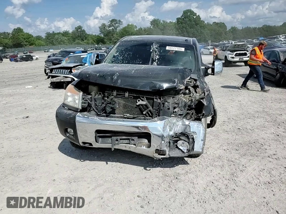 2011 Nissan Titan SL z VIN 1N6AA0EC8BN312137, wystawiony jako Copart lot #60227105 z przebiegiem 194 973 mil mil oraz Szkoda całkowita • Salvage title. Historia ofert i sprzedaży dostępna na DreamBid. Obrazek 14.